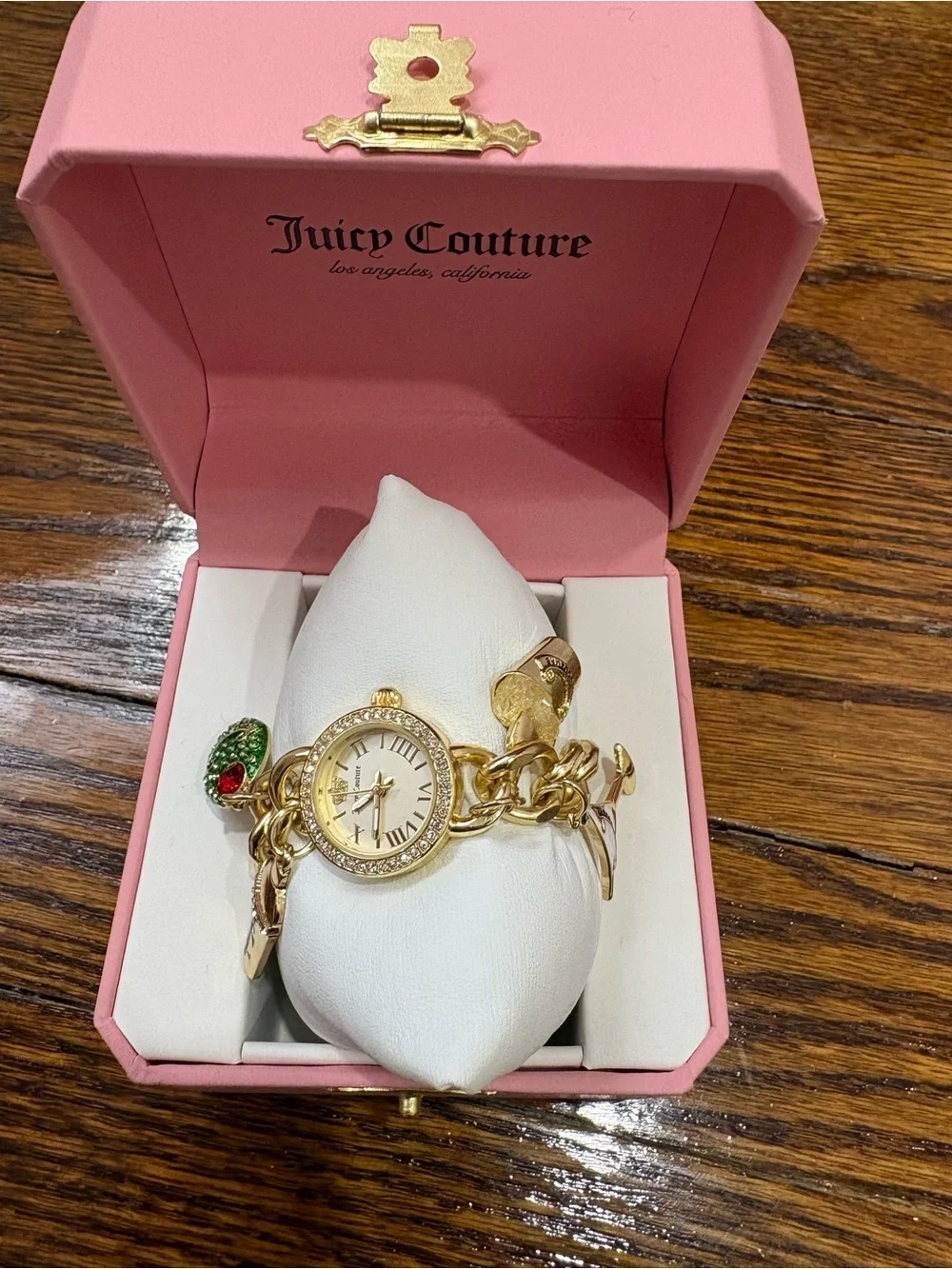Juicy Couture Gold Tone Charm Bracelet Watch with Green and Red Accent